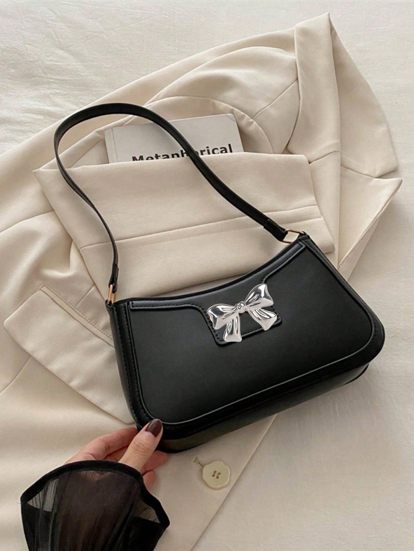 Sac noire avec p’tit noeud motifé